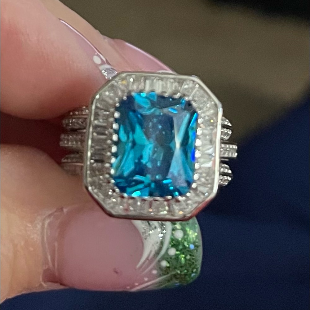 Women’s Blue Topaz Cz Rhodium ring.